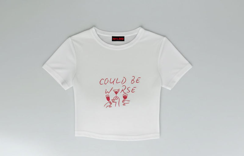 Could Be Worse” Women’s Baby Tee – Minimal Graphic Crop T-Shirt | physical by Acid House™ (formerly Zyra Drip)