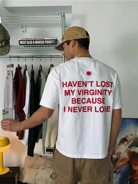 Funny Men’s White Graphic T-Shirt – “Haven’t Lost My Virginity Because I Never Lose” Statement Tee | physical by Acid House™ (formerly Zyra Drip)