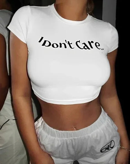 I Don’t Care Baby Tee for Women – White Cropped Graphic Top | physical by Acid House™ (formerly Zyra Drip)