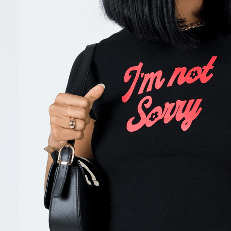 I’m Not Sorry Black Baby Tee for Women | physical by Acid House™ (formerly Zyra Drip)
