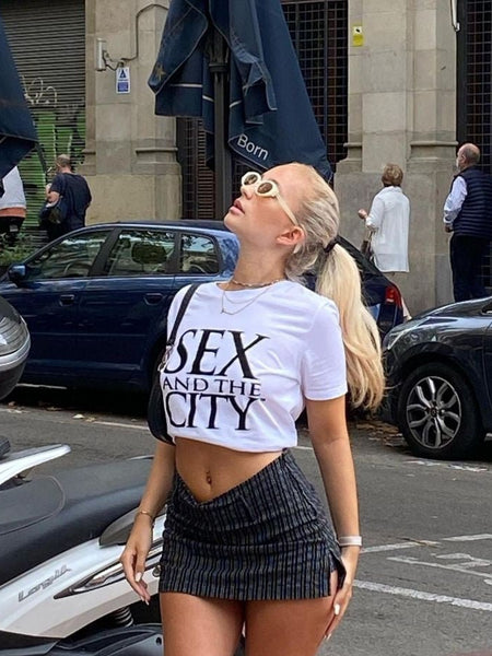 Trendy Sex and the City Crop Top White Graphic Baby Tee | Stylish Tee for Gen Z Fans | physical by Acid House™ (formerly Zyra Drip)