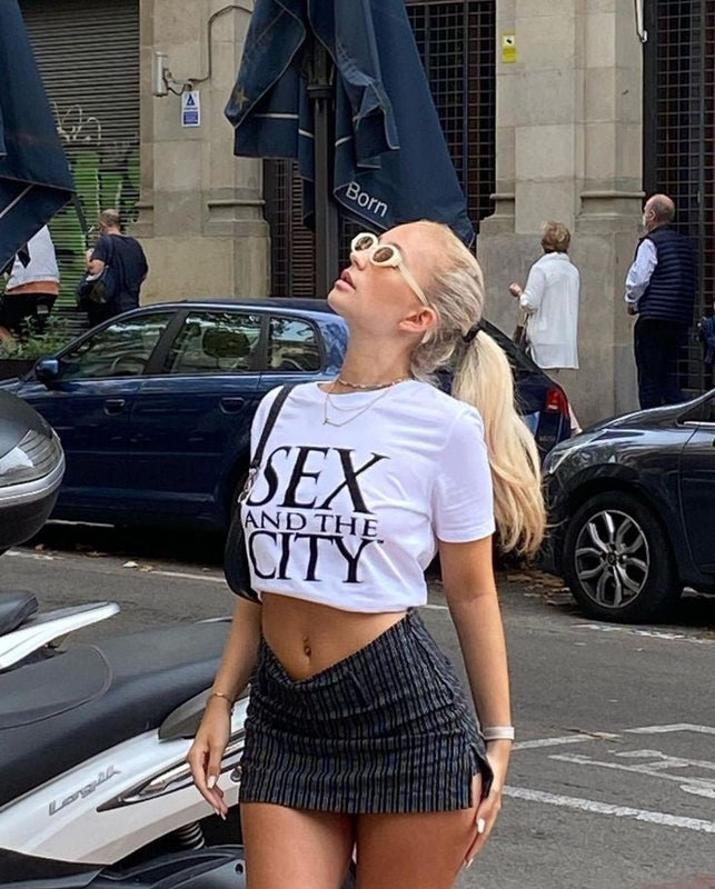 Trendy Sex and the City Crop Top White Graphic Baby Tee | Stylish Tee for Gen Z Fans | physical by Acid House™ (formerly Zyra Drip)