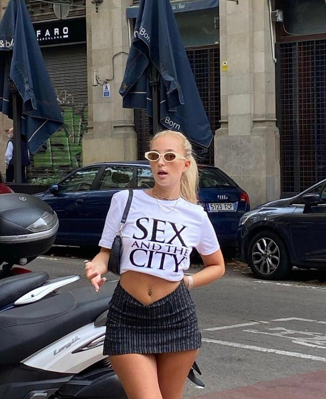 Trendy Sex and the City Crop Top White Graphic Baby Tee | Stylish Tee for Gen Z Fans | physical by Acid House™ (formerly Zyra Drip)