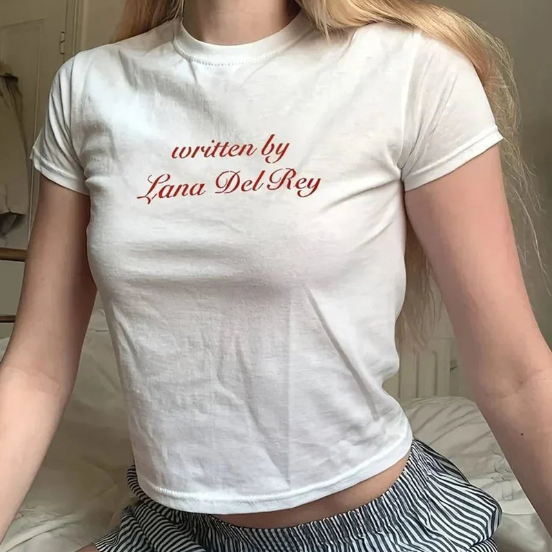 Written by Lana Del Rey Baby Tee – White Baby Tee | Crop Top | physical by Acid House™ (formerly Zyra Drip)